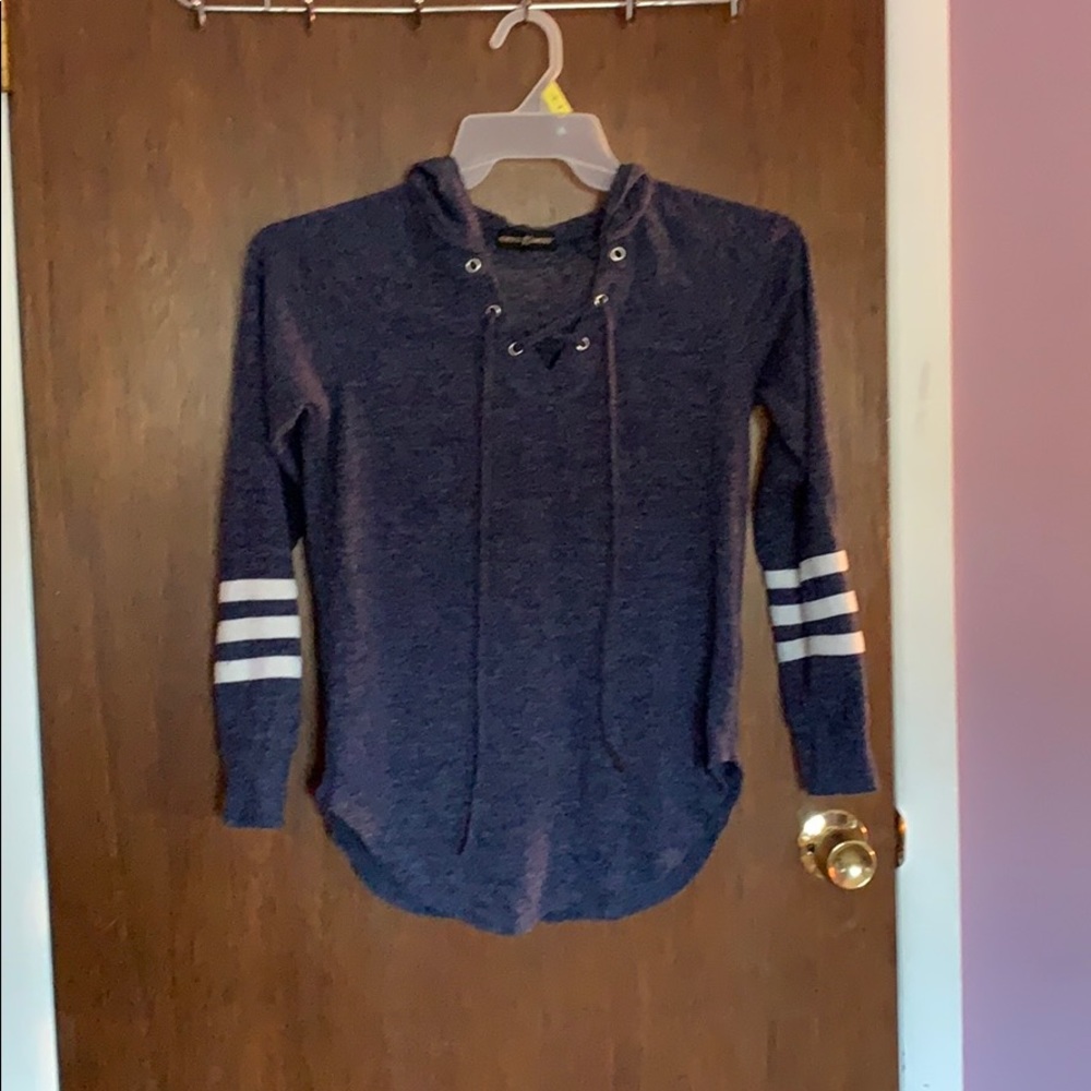 blue long sleeve shirt with striped sleeves & hood